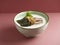 Century Egg and Shredded Pork Congee served in a dish isolated on mat side view on grey background