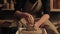 Ceramic art man hands shaping clay potter wheel