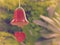 Ceramic bell painted red color. Hanging decorated with red heart