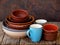 Ceramic, clay empty handmade bowl, dishes and cup on wooden background. Different pottery earthenware utensil, kitchenware.