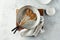 Ceramic crockery tableware on a gray background.