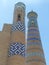 Ceramic decorated  towers of a religious building  of Khiva in Uzbekistan.