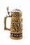 Ceramic german beer mug with lid on white background