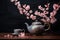 a ceramic japanese teapot surrounded by cherry blossoms