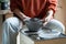 Ceramic master shaping bowl on pottery wheel in studio, creating pieces from clay