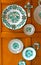 Ceramic painted regional dishes on the wooden background