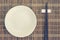 Ceramic plate and wood chopsticks