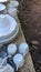 Ceramic plates, cups, glass glasses were thrown into a landfill