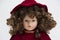 Ceramic porcelain handmade doll with curly brown hair and red dress