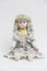 Ceramic porcelain handmade doll with long white hair and floral dress