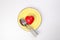 ceramic retro yellow food plate fork spoon with three dimension 3d red hart symbol on top of it white background copy text space