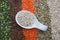 Ceramic spoon with pearl barley