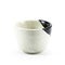 Ceramic teacup on white background