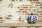 Ceramic teapot with old vintage brick wall background.