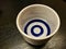 Ceramics glass of sake on wood table.