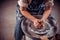 Ceramist master making ceramic pot on the pottery wheel . Close-up.