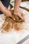 Ceramist in Workshop. Closeup of Working Hands of Male Potter