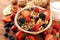 Cereal. Bowl of granola cereals, fruits and milk for breakfast. Muesli with cereals