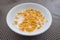 Cereal bowl with milk on the wood table