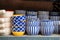 Cereal bowls and dishes of handpainted, ceramic pottery on sale at a market in New Delhi India