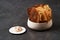 Cereal Chips with Seeds and kimchi mayonnaise sauce on dark background