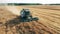 Cereal crops in the process of harvesting by an agricultural machine