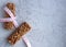 cereal fitness bars with centimeter tape on a gray background