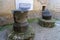 Cereal mill stones of the ancient city in Herculaneum archaeological park, Naples, Italy.