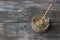 Cereal mixture for healthy keto crackers of chia seeds, flax, sesame, ground pumpkin seeds in a glass jar on wooden background