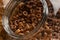 Cereals, granola in a jar texture close-up, macro
