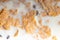 Cereals, granola with milk texture close-up, macro