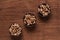 Cereals in metal bowl on brown wooden table