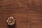 Cereals in metal bowl on brown wooden table