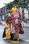 A ceremonial elephant heads down a street in Kandy towards the marshalling area for the Day Perahera in Sri Lanka.