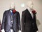 Ceremonial groom suits or business suits on display blue and black