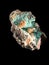 Cerussite on Manganese in front of black background