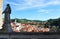 Cesky Krumlov, Czech republic - July 9, 2015: View of Cesky Krumlov with a statue of some saint man