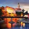 Cesky Krumlov historical old town at dramatic sunset, Southern Bohemia, Czech Republic