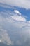 Cessna aircraft flying in the storm cloud and blue sky