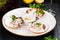 Ceviche. Finely chopped raw squid marinated in lemon juice served in seashell