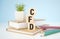 CFD on wood cubes, banknotes and calculator on the background. CFD - short for Contracts For Difference. Business and