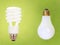 CFL and regular bulbs on green