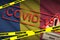 Chad flag and Covid-19 quarantine yellow tape with red stamp. Coronavirus or 2019-nCov virus