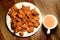 Chai with pakoras and bhajiyas served on plate