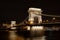 Chain Bridge in Budapest - a landmark in the capital of Hungary at night with illumination