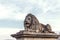 Chain bridge lion at sunset with tourists