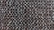 Chain-mail or Hauberk texture, metal protective armor of medieval or middle ages times. Hauberk medieval knight equipment shirt of