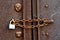 Chain and Padlock on Old Steel Door