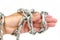 Chained hand of an adult man with strong chain