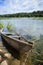 Chained wooden rowing boat